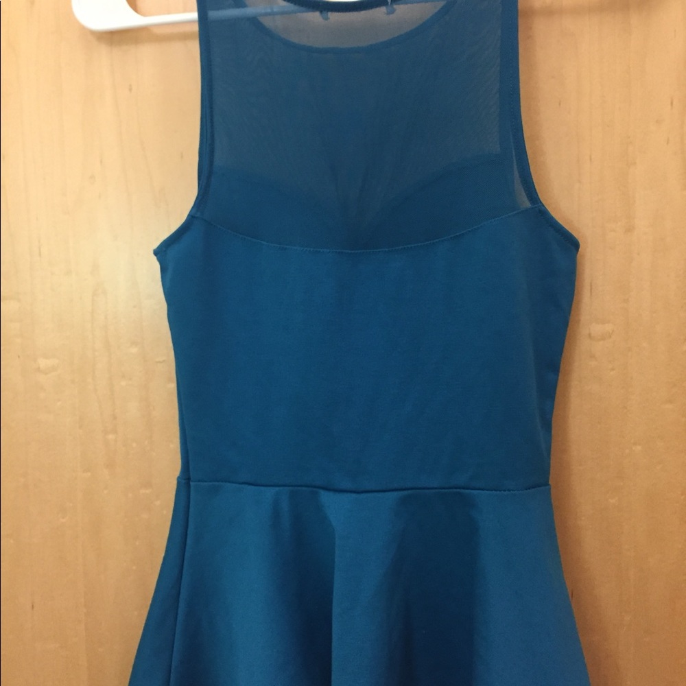 Sexy yet cute teal mesh peplum top